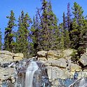 Tangle Falls  A clear sunny day is a difficult time to shoot waterfalls and have them turn out silky like this - I had to use 3 filters to stop down the exposure: a polarizer, an ND grad, and a neutral density. Tangle Falls, along the Icefields Parkway in Alberta.